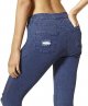 Women's torn knee high denim leggings